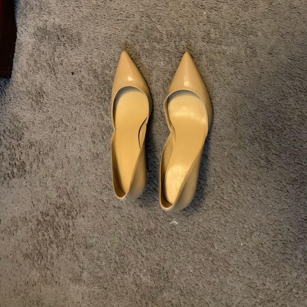 Michael Kors nude pumps worn a few times.